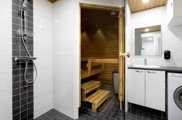 Фото номера Апартаменты с 2 спальнями Отель Holiday Club Saariselkä г. Саариселькя 7