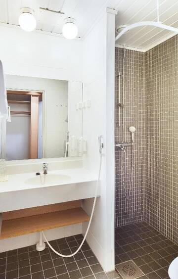Фото номера Семейный номер эконом-класса - Без доступа в спа-центр Отель Holiday Club Saariselkä г. Саариселькя 4