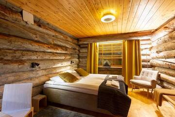 Фото номера Двухместный номер с 2 отдельными кроватями Гостевой дом Log House Kuukkeli Teerenpesä г. Саариселькя 7