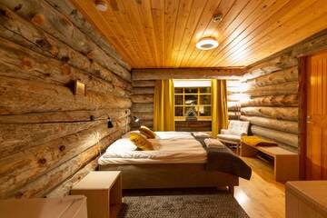 Фото номера Двухместный номер с 2 отдельными кроватями Гостевой дом Log House Kuukkeli Teerenpesä г. Саариселькя 10