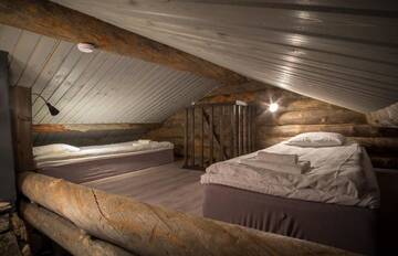 Фото номера Апартаменты с 1 спальней Дома для отпуска Polar Aurora Cabins г. Саариселькя 2