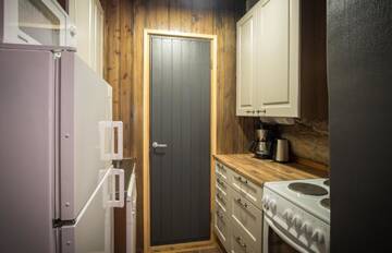 Фото номера Апартаменты с 1 спальней Дома для отпуска Polar Aurora Cabins г. Саариселькя 4