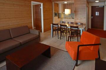 Фото номера Апартаменты с 2 спальнями и сауной Отель Lapland Hotels Riekonlinna г. Саариселькя 2