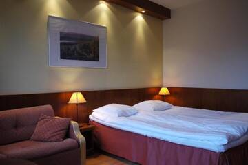 Фото номера Стандартный двухместный номер с 2 отдельными кроватями Отель Lapland Hotels Riekonlinna г. Саариселькя 3