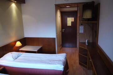 Фото номера Стандартный двухместный номер с 2 отдельными кроватями Отель Lapland Hotels Riekonlinna г. Саариселькя 4