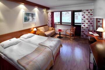 Фото номера Стандартный трехместный номер Отель Lapland Hotels Riekonlinna г. Саариселькя 5