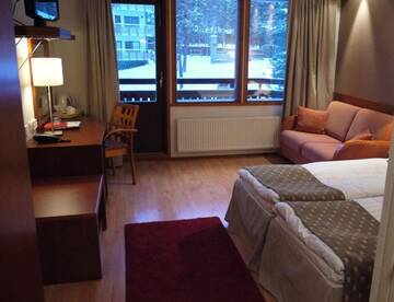 Фото номера Стандартный трехместный номер Отель Lapland Hotels Riekonlinna г. Саариселькя 2