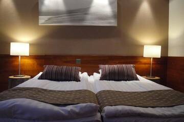 Фото номера Стандартный трехместный номер Отель Lapland Hotels Riekonlinna г. Саариселькя 3