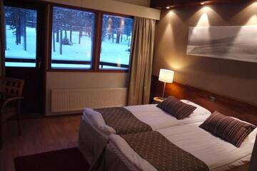 Фото номера Стандартный трехместный номер Отель Lapland Hotels Riekonlinna г. Саариселькя 4
